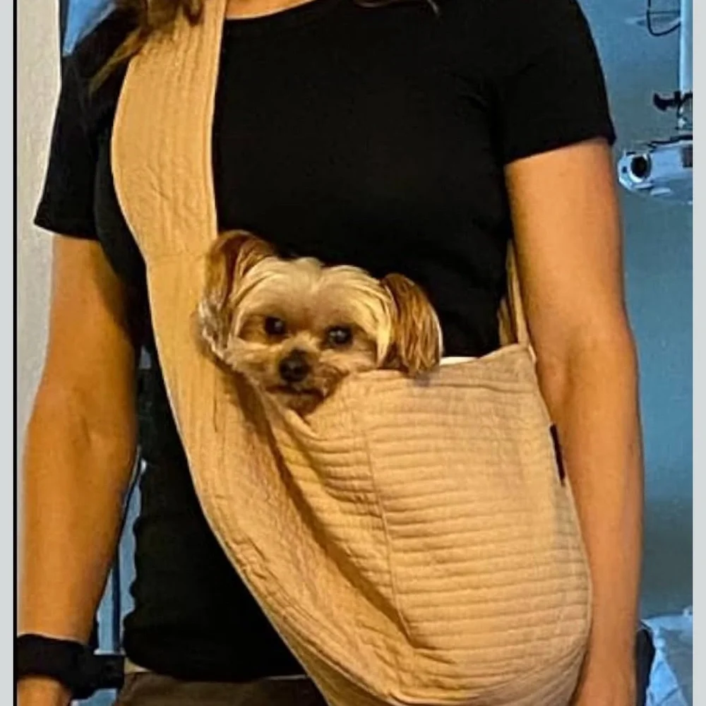 Brand new. Tan Pet Sling Carrier for small pets.